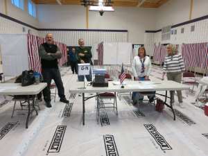 POLL WORKERS IN SALEM, NEW HAMPSHIRE GETTING READY FOR THE DAY