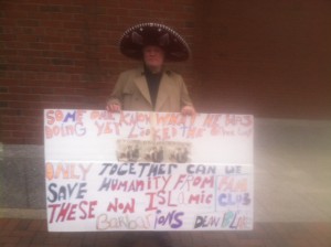 APRIL 6 MONDAY protestor of the day, Federal Courthouse, Boston