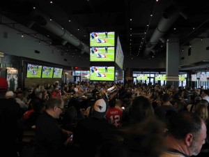 Nearly a thousand New England Patriots fans jammed into a sports