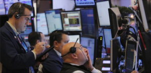 Traders at the New York Stock Exchange (Courtesy Reuters via Fox Business)