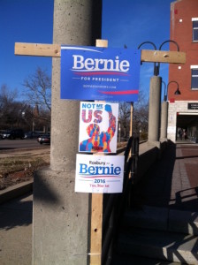 Bernie Sanders signs outside a polling place in Roxbury, Massachusetts