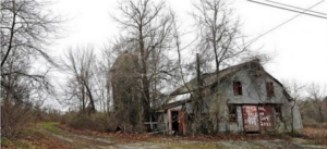 An old barn stands on land located in Dudley, Mass., which is the site of a proposed Muslim cemetery, a project vigorously opposed by area residents. (Courtesy of Fox News via AP Photo:Elise Amendola)