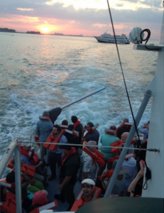 Evacuees from a wedding on the "Majesty" as they were being ferried Saturday night to a larger ship