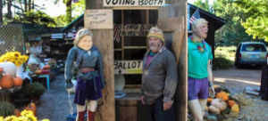 new-hampshire-vegetable-stand-owner-chris-owens-in-front-of-his-outhouse-polling-place-courtesy-of-fox-news-via-ap-via-nhnpr